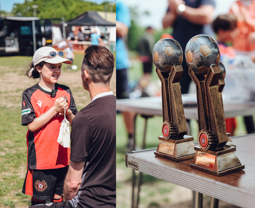 A girl wearing Horsley FC kit and club football trophies